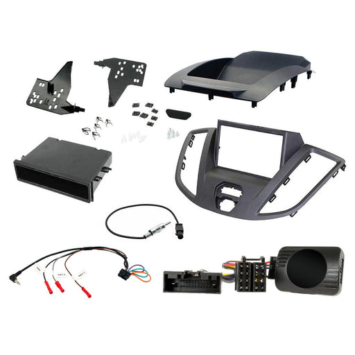 Ford Transit 2015-2021 Full Car Stereo Installation Kit, DARK GREY Double DIN fascia panel with black top hood , steering wheel control interface, an antenna adapter and a universal patchlead.