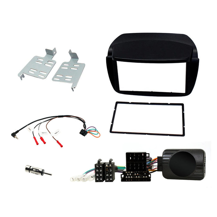 Vauxhall Combo 2012-2015 Full Car Stereo Installation Kit, BLACK Double DIN fascia panel, steering wheel control interface, an antenna adapter and universal patchlead